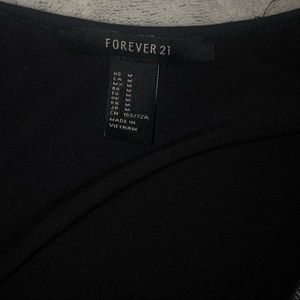Forever 21 Dresses - Black Skort dress Forever 21 Dresses - Black Skort dress